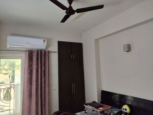 Building Lobby in 2.5 BHK Apartment at Mahagun Moderne, Sector 78 – for Sale
