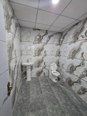 Bathroom in 3 BHK Builder Floor at Sahastradhara Road – for Sale