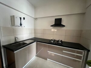 Kitchen in 2 BHK Apartment at Gera World of Joy, Kharadi – for Rent