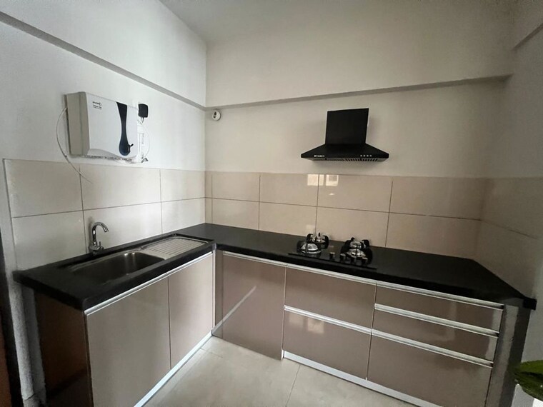 Kitchen, gera-world-of-joy 2 Bedroom 820 Sq.Ft. Apartment In Kharadi Pune 10550079