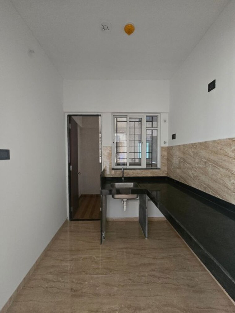 Kitchen, vtp-leonara 1 Bedroom 487 Sq.Ft. Apartment In Mahalunge Pune 10550091