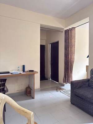 Living Room in 1 BHK Apartment at UPAVP Brahmputra Enclave, Siddharth Vihar – for Rent
