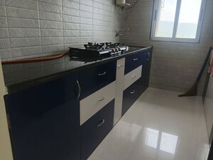 Kitchen in 2 BHK Apartment at Vihang Valley Phase 3, Kasarvadavali – for Rent