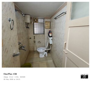 Bathroom in 3 BHK Apartment at Dheeraj Valley, Goregaon East – for Rent