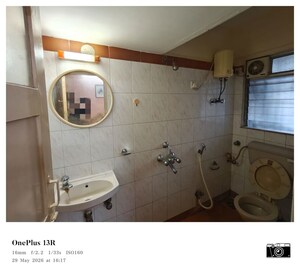 Bathroom in 3 BHK Apartment at Dheeraj Valley, Goregaon East – for Rent