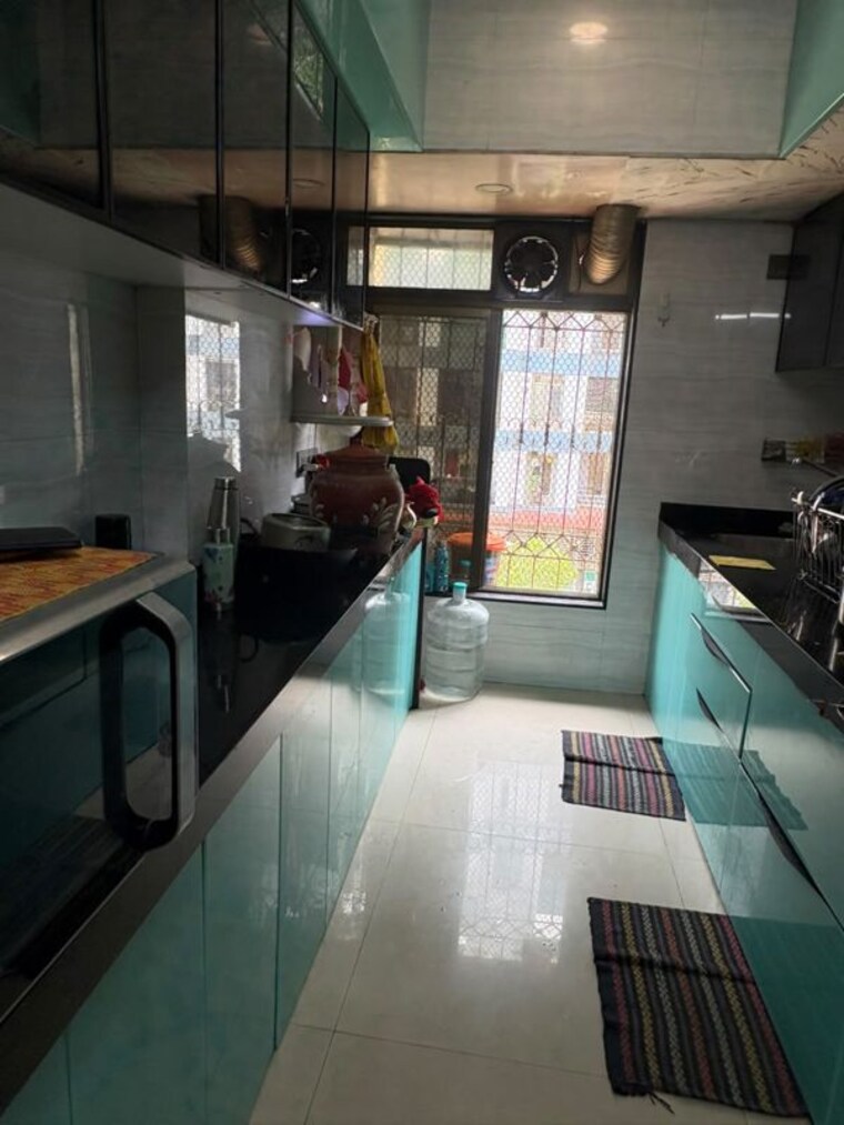 Kitchen, arc-excel-arc 3 Bedroom 1050 Sq.Ft. Apartment In Mira Road Thane 10550313