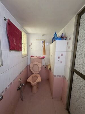 Bathroom in 2 BHK Apartment at Asmita Jyoti CHS, Malad West – for Rent