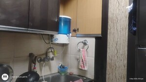 Kitchen in 3 BHK Apartment at Raj Nagar – for Sale