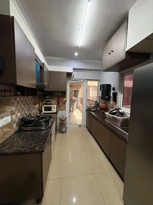 Kitchen in 2.5 BHK Apartment at JKG Palm Resort, Raj Nagar Extension – for Sale