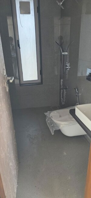 Bathroom in 2 BHK Apartment at Kanakia Miami, Mahim – for Rent
