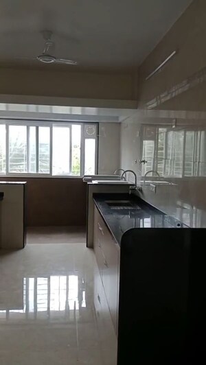 Kitchen in 3 BHK Apartment at Deshpande Shikshak CHS, Sanewadi – for Sale