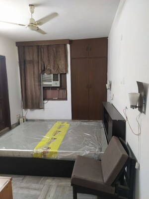 Bedroom in 3 BHK Builder Floor at South Extension ii – for Rent