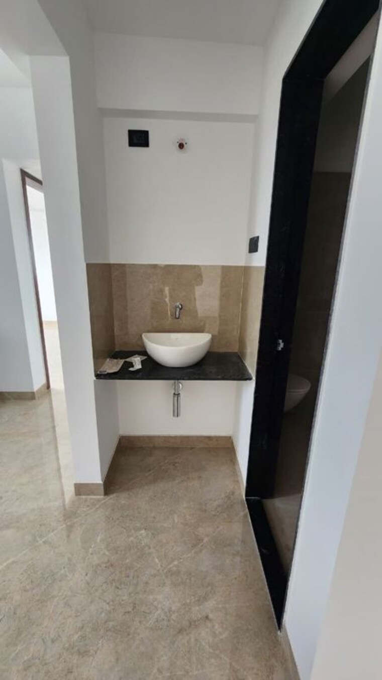 Bathroom, skyrise-sparkle 2 Bedroom 1000 Sq.Ft. Apartment In Dhanori Pune 10551177