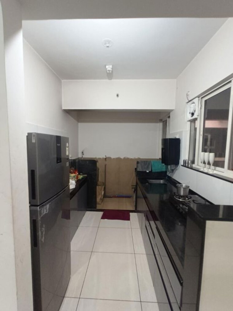 Kitchen, vj-yashone-infinitee 2 Bedroom 803 Sq.Ft. Apartment In Tathawade Pune 10551379