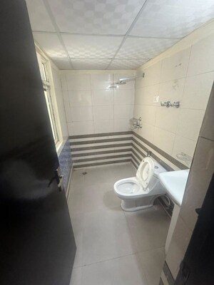 Bathroom in 3 BHK Apartment at Aims Golf City, Sector 75 – for Rent