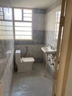 Bathroom in 1 BHK Apartment at Ansal Palam Triangle, Palam Vihar Extension – for Rent