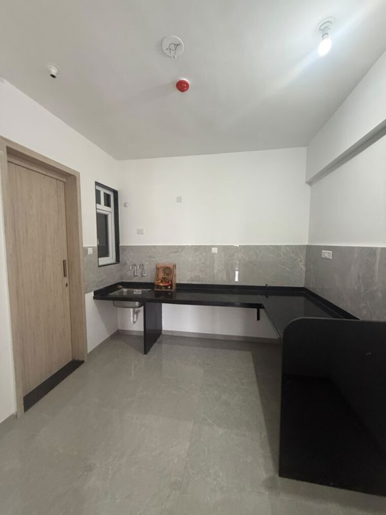 Kitchen, zen-elite 2 Bedroom 780 Sq.Ft. Apartment In Kharadi Pune 10551456
