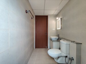 Bathroom in 3.5 BHK Apartment at Bhartiya Nikoo Homes Phase 2, Thanisandra Main Road – for Rent