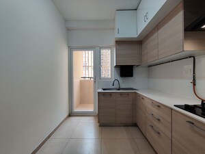 Kitchen in 3.5 BHK Apartment at Bhartiya Nikoo Homes Phase 2, Thanisandra Main Road – for Rent