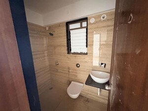 Bathroom in 2 BHK Apartment at Raga Top Towers, Wakad – for Rent