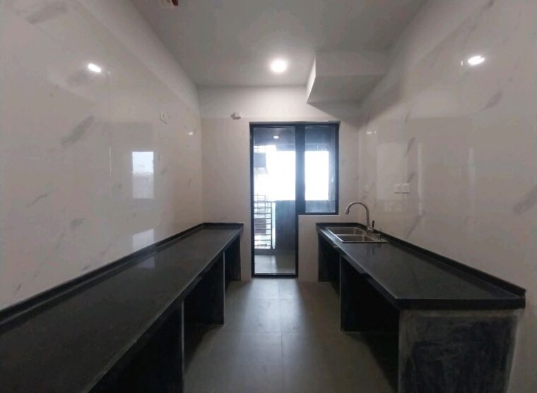 Kitchen, risland-the-icon 2 Bedroom 671 Sq.Ft. Apartment In Dhokali Thane 10551492