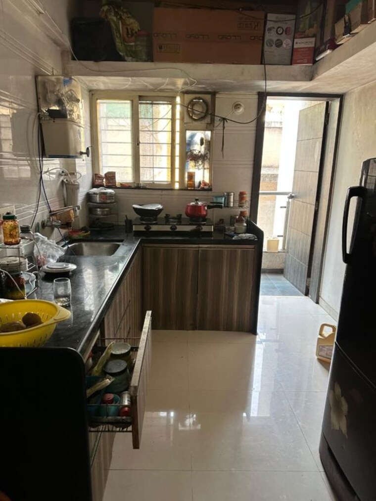 Kitchen, shalimar-residency-lohegaon 2 Bedroom 956 Sq.Ft. Apartment In Lohgaon Pune 10529021