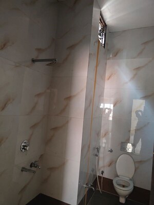 Bathroom in 3 BHK Apartment at RWA Jalvayu Vihar, Sector 25 – for Rent