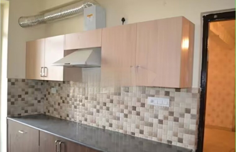 Kitchen, ansal-api-celebrity-gardens 3 Bedroom 1825 Sq.Ft. Apartment In Sushant Golf City Lucknow 10551592