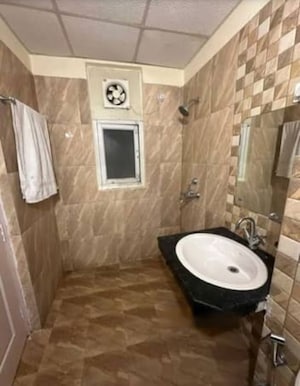 Bathroom in 3 BHK Apartment at Ansal API Celebrity Gardens, Sushant Golf City – for Rent