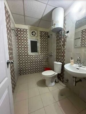 Bathroom in 3 BHK Apartment at Ansal API Celebrity Gardens, Sushant Golf City – for Rent