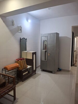 Living Room in 2 BHK Apartment at Dharti Green, Tathawade – for Rent