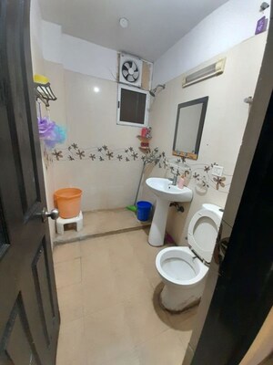 Bathroom in 2 BHK Apartment at Prateek Wisteria, Sector 77 – for Sale