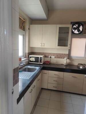 Kitchen in 3.5 BHK Apartment at Orchid Petals, Sector 49 – for Rent