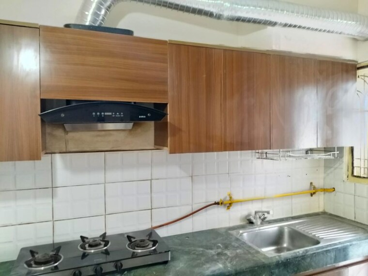 Kitchen, bptp-park-elite-floors 3 Bedroom 1300 Sq.Ft. Apartment In Sector 85 Faridabad 10551807