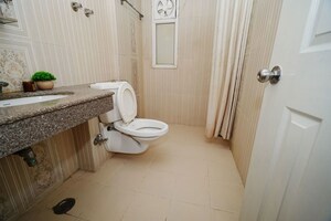 Bathroom in 3.5 BHK Apartment at Purvanchal Royal City, Chi V Greater Noida – for Sale