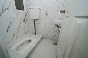 Bathroom in 3.5 BHK Apartment at Purvanchal Royal City, Chi V Greater Noida – for Sale
