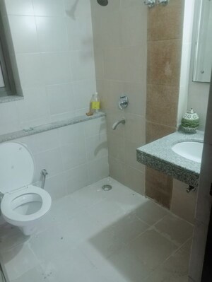 Bathroom in 2 BHK Apartment at Unitech Uniworld Gardens 2, Sector 47 – for Rent