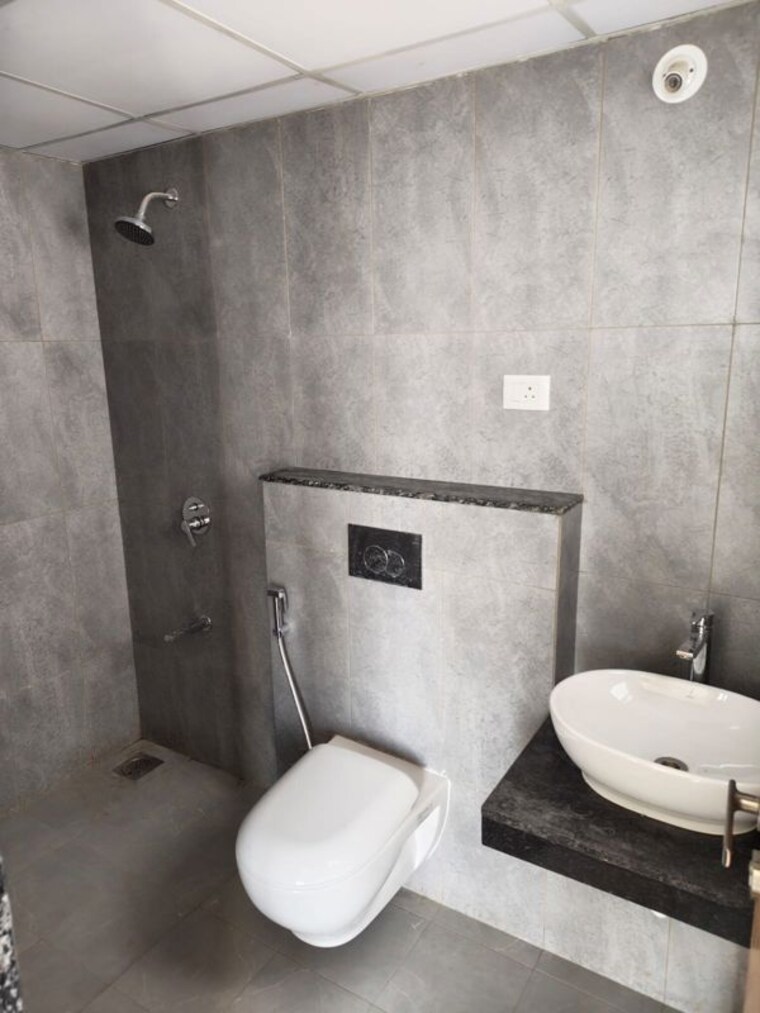 Bathroom, gera-planet-of-joy 2 Bedroom 1000 Sq.Ft. Apartment In Kharadi Pune 10552091