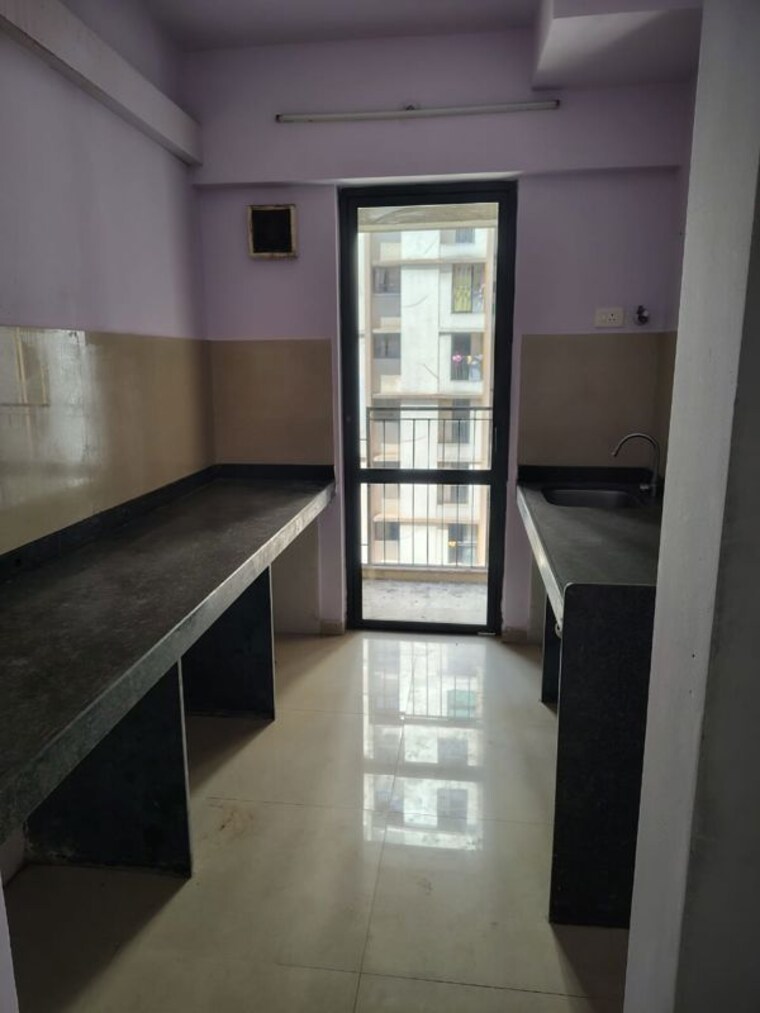 Kitchen, lodha-palava-city-lakeshore-greens 2 Bedroom 734 Sq.Ft. Apartment In Dombivli East Thane 10552106