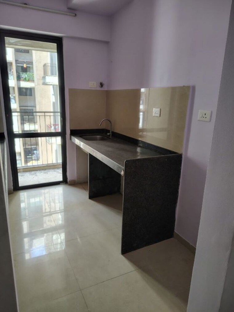 Kitchen, lodha-palava-city-lakeshore-greens 2 Bedroom 734 Sq.Ft. Apartment In Dombivli East Thane 10552106
