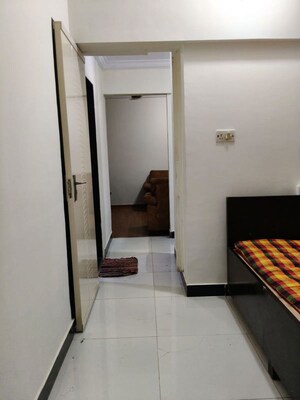 Building Lobby in 2 BHK Apartment at Royal Palms, Goregaon East – for Rent
