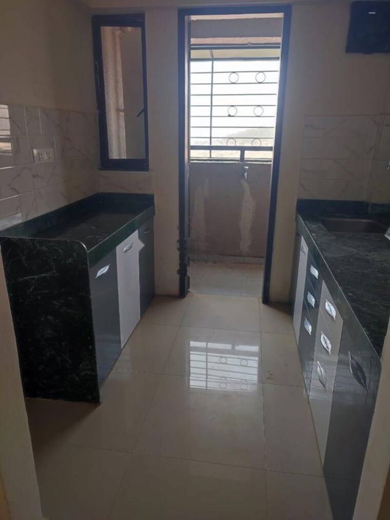 Kitchen, mantra-montana-phase-1 1 Bedroom 500 Sq.Ft. Apartment In Dhanori Pune 10552588