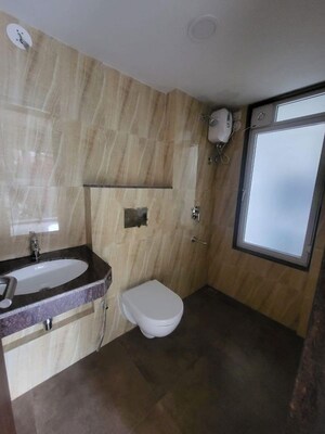 Bathroom in 2 BHK Apartment at Kalpataru Immensa, Kolshet Road – for Rent