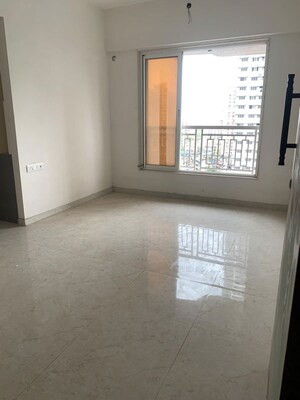Living Room in 1 BHK Apartment at ISD Maple Heights, Agripada – for Sale