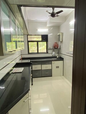 Kitchen in 2 BHK Apartment at Bredco Viceroy Court, Kandivali East – for Rent