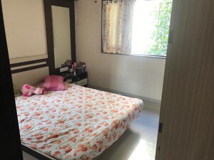 Bedroom in 2 BHK Apartment at Mahalaxmi Nagar CHS, Warje – for Rent
