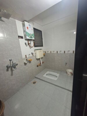 Bathroom in 2 BHK Apartment at Raj Ratna CHS, Borivali West – for Sale