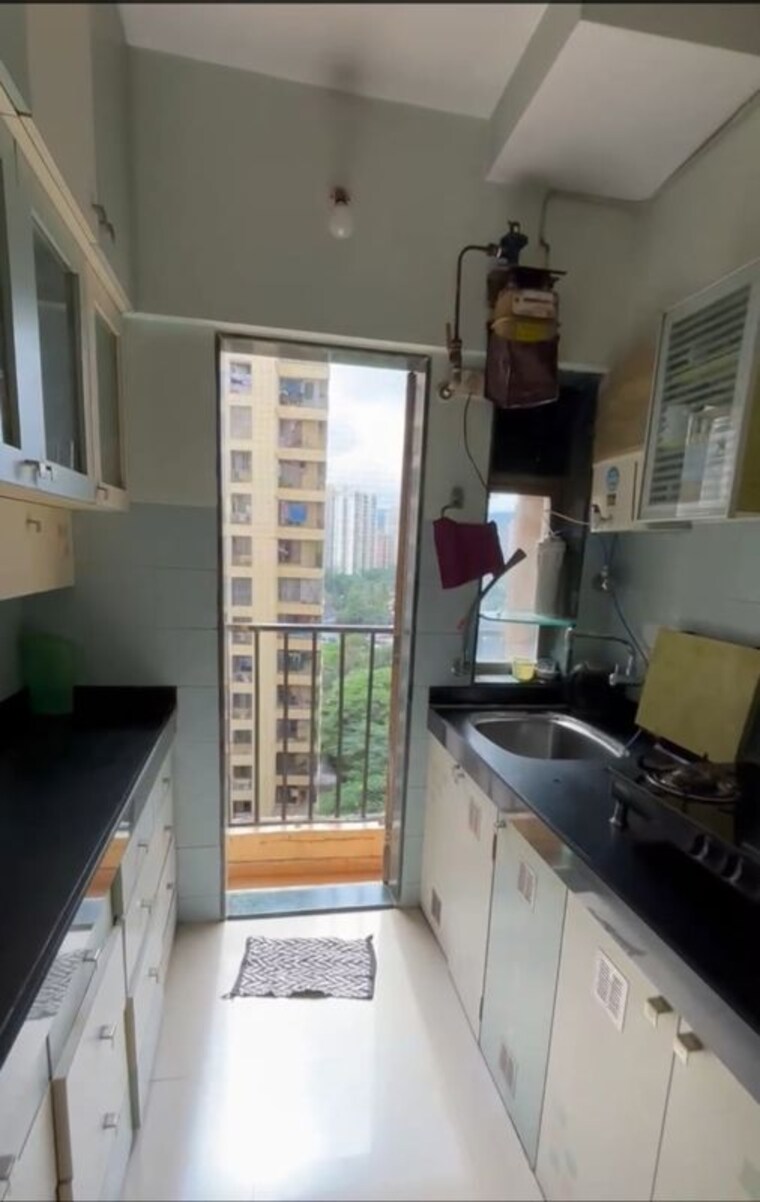 Kitchen, everest-world-gardenia 2 Bedroom 650 Sq.Ft. Apartment In Dhokali Thane 10552913