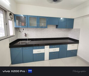 Kitchen in 2 BHK Apartment at Wadgaon Sheri – for Rent