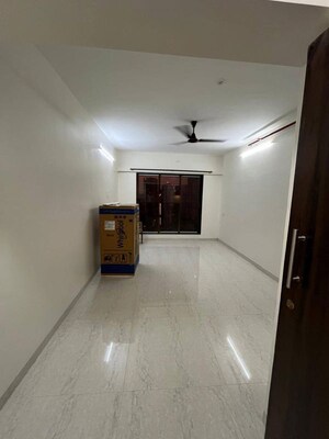 Living Room in 2 BHK Apartment at Pratham ARC Aura, Andheri West – for Rent